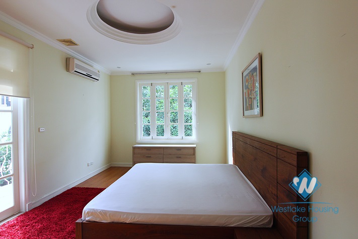 An elegant and high-end villa with a big yard for rent in Tay Ho area